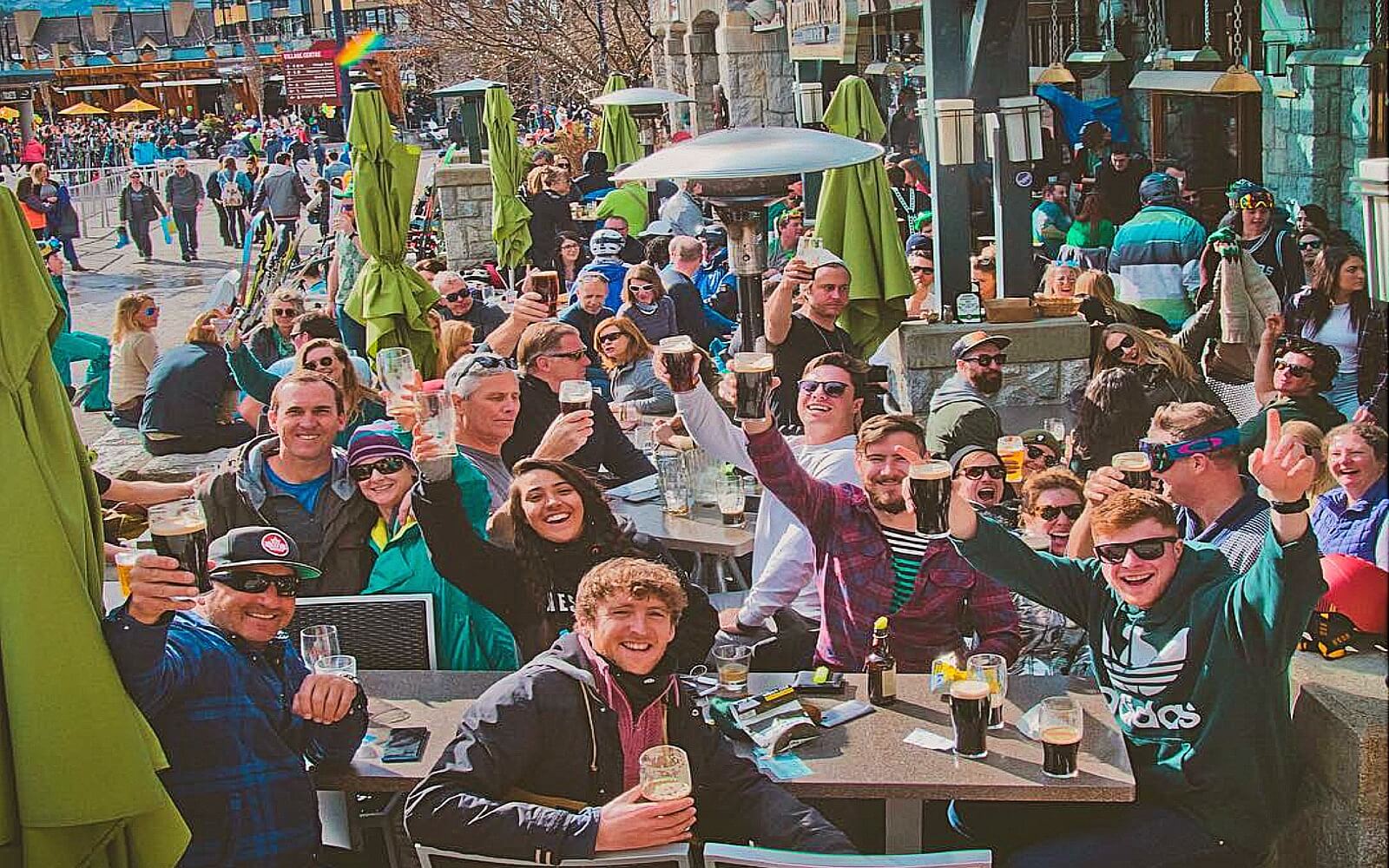 A crowd drinks on the patio at Dubh Linn Gate, Whistler