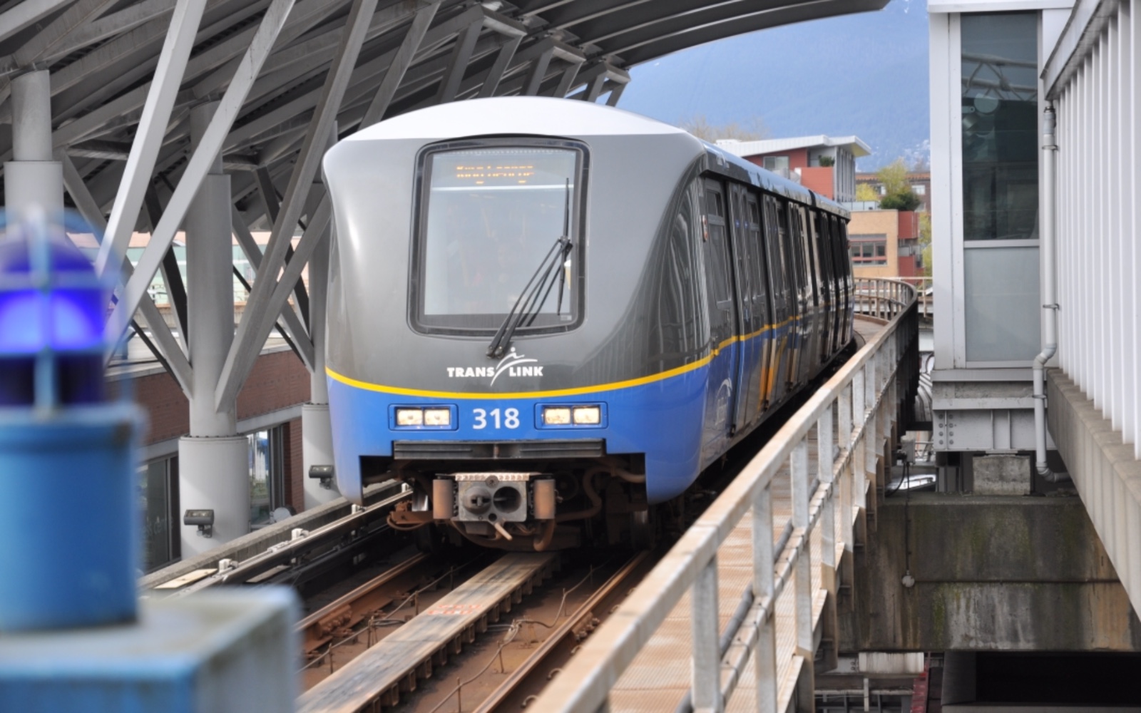 The skytrain arrives at a stop
