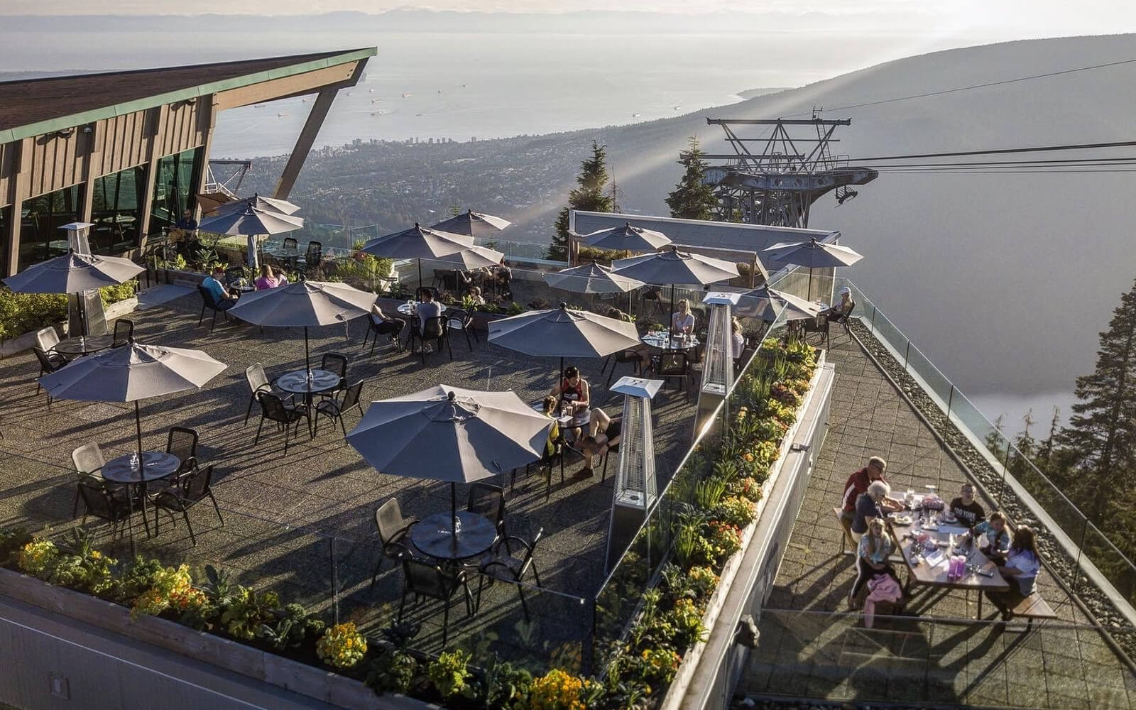grouse mountain patio restaurant with bird's eye view of vancouver harbour
