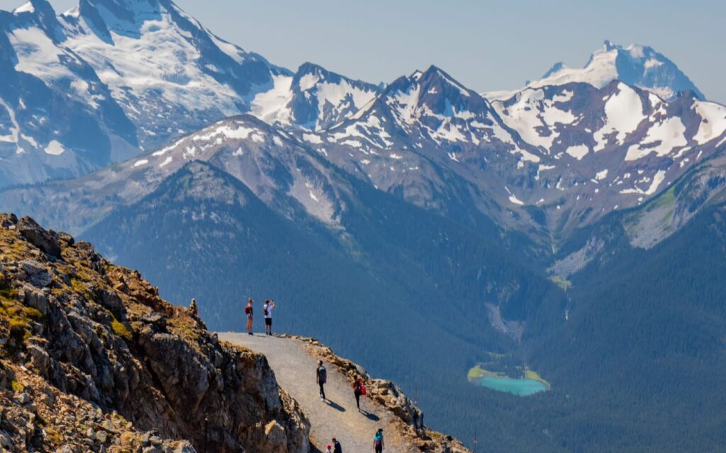 hikers hiking near whistler bc on a day trip from vancouver
