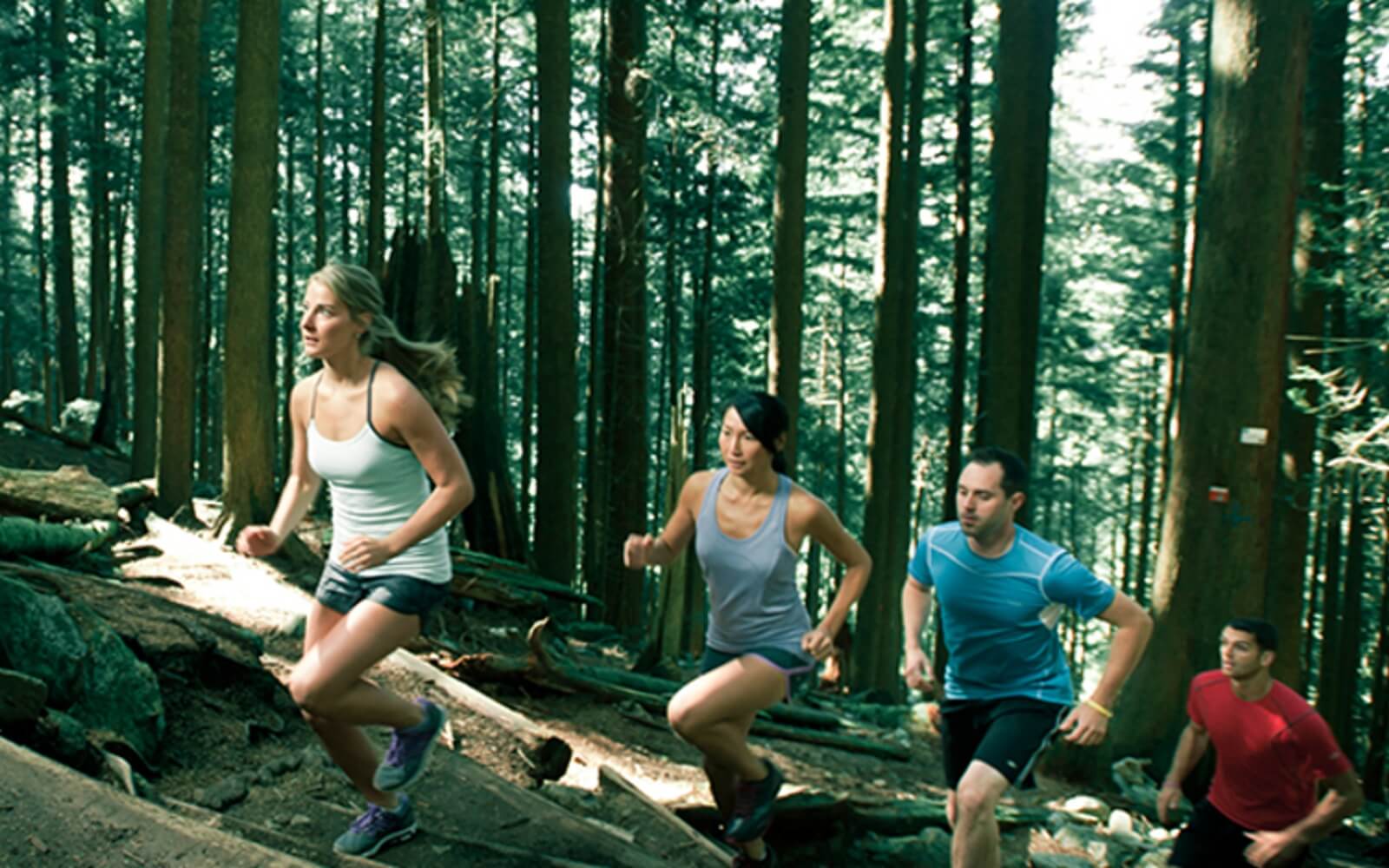 runners hiking up the grouse grind in vancouver bc canada