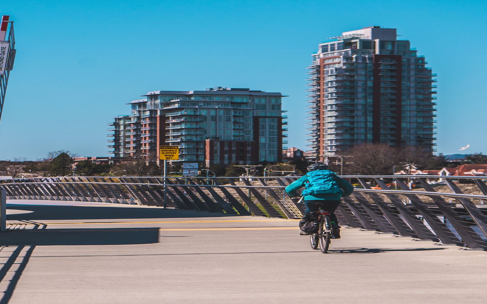a man bikes the Seaside Loop, Victoria BC