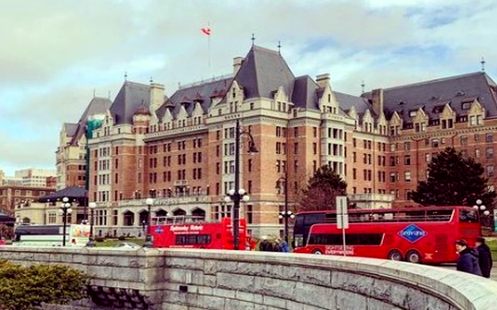 Hop on Hop off buses outside the Empress Hotel, Victoria BC