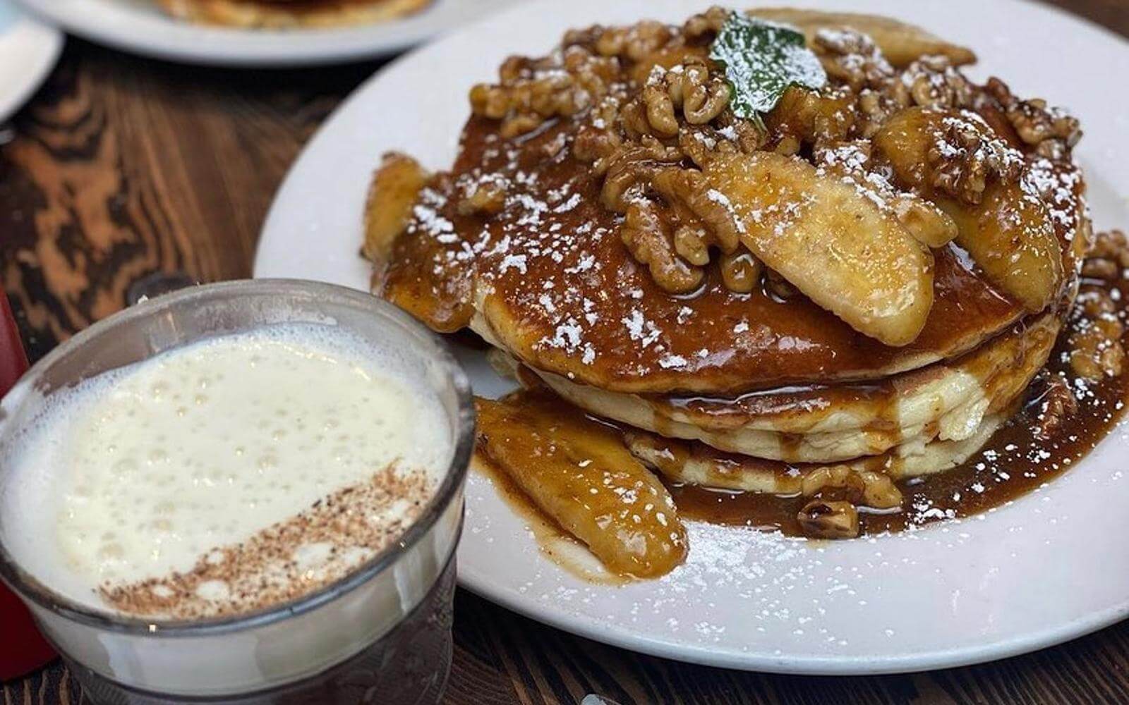 pancake stack with caramalized pears and walnuts at jam cafe in vancouver bc canada