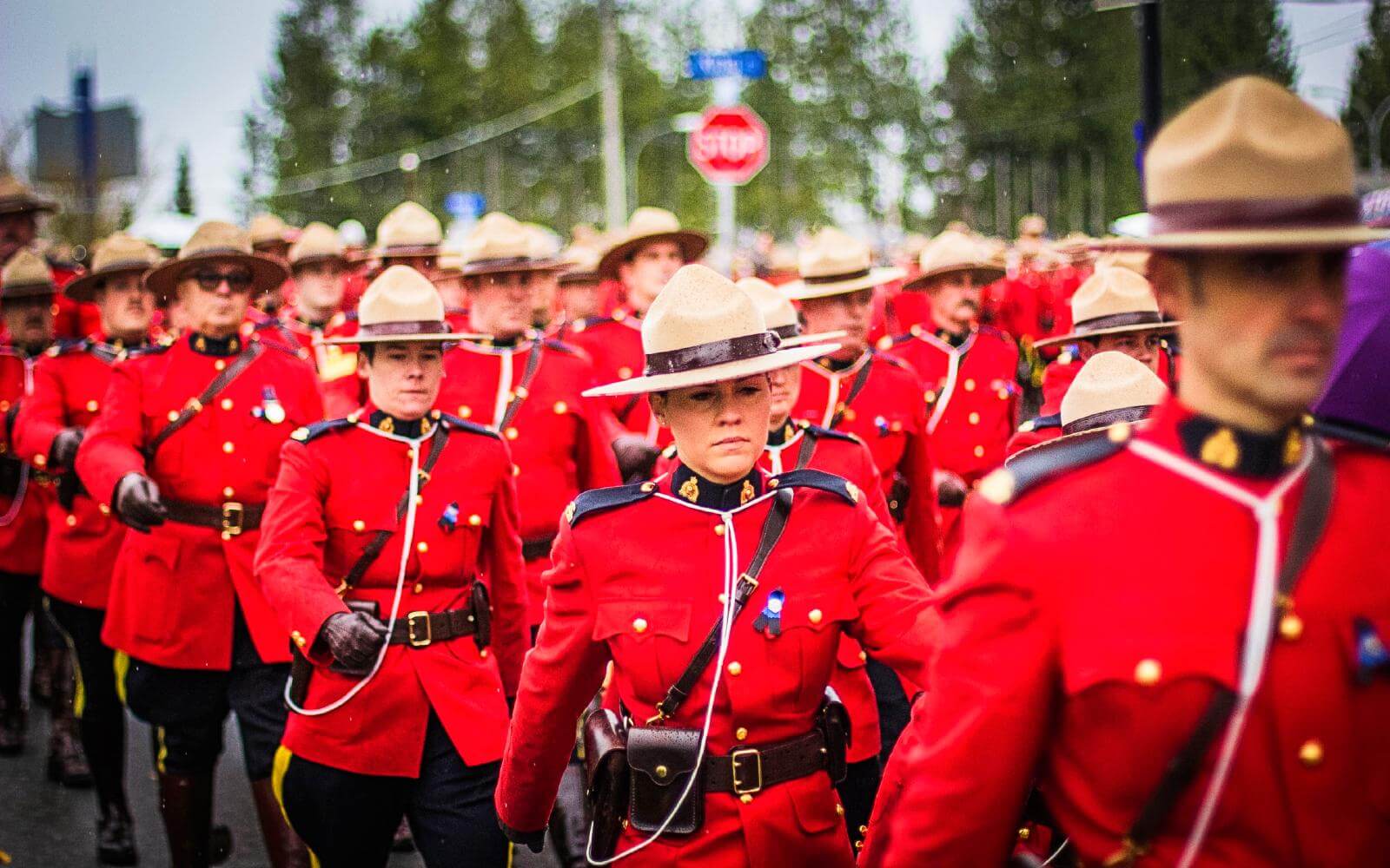 rcmp officers marching in the canada day parade on july 1st in vancouver bc canada