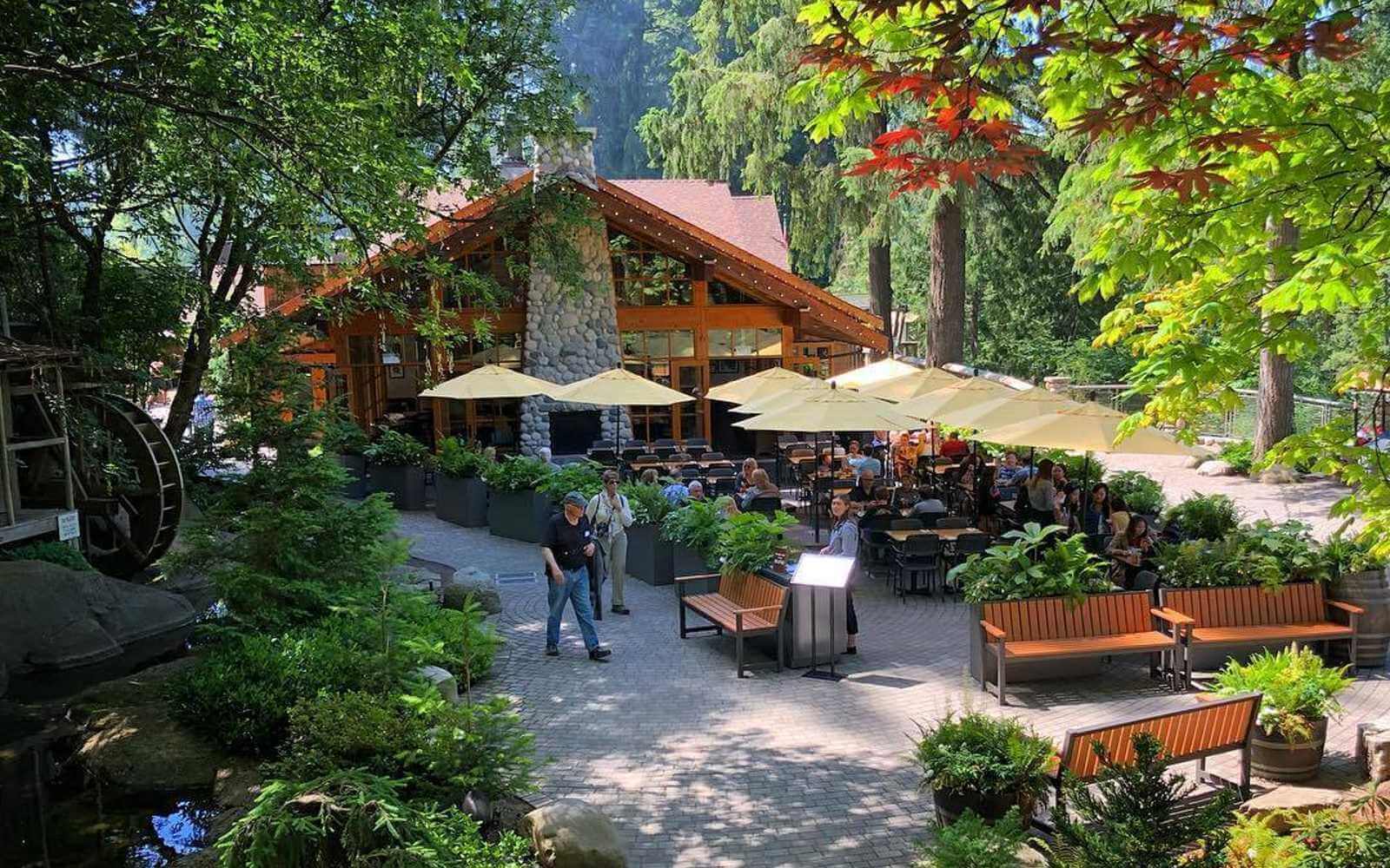 the outdoor patio at cliffhouse restaurant and bar at capilano suspension bridge in vancouver canada