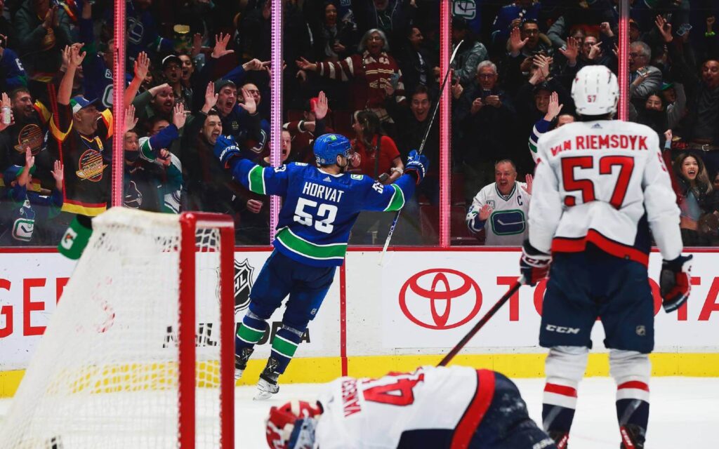 crowd goes wild after bo horvat of the vancouver canucks scores a goal
