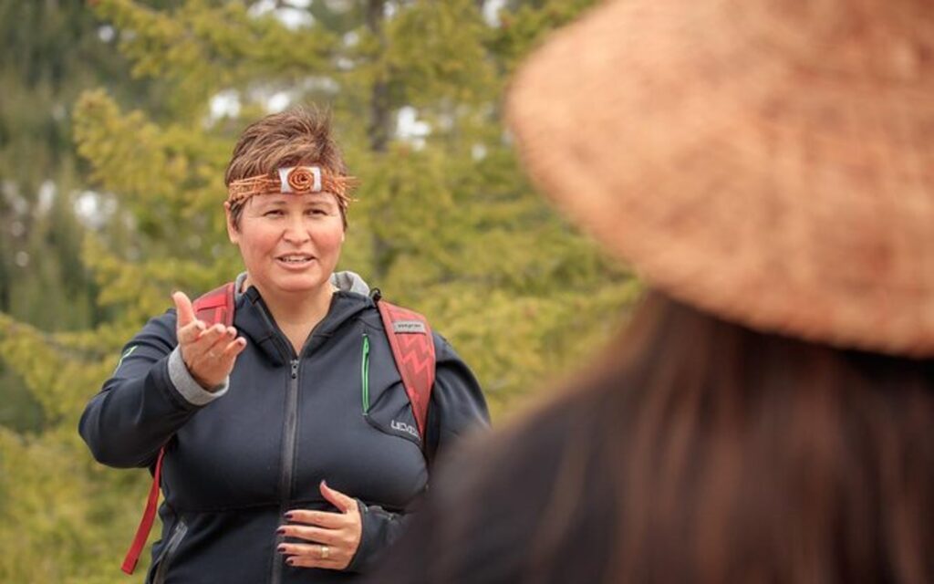 guide explaining nature on the talking trees walking tour of vancouver