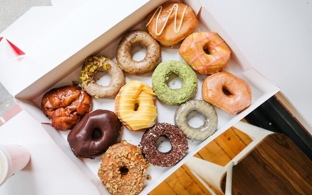 a box of donuts from the vancouver downtown and gastown