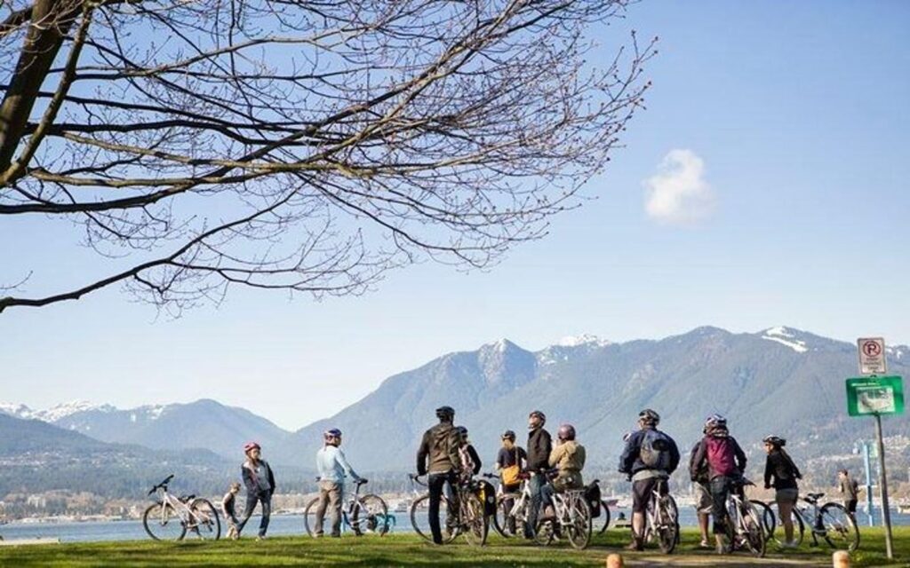 a group partakes in the vancouver highlights bike tour