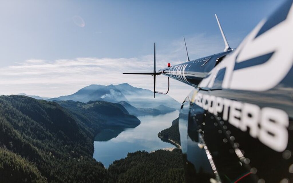 a vancouver helicopter tour flies over the coast mountains