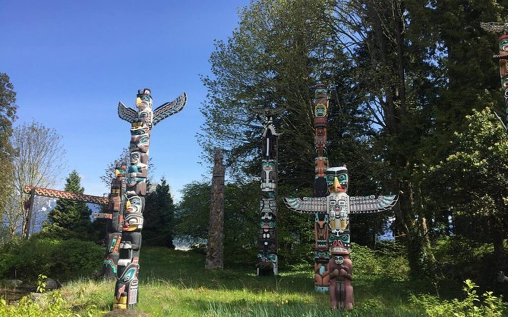 a look at the famous stanley park totem poles on an indigenous walking tour.