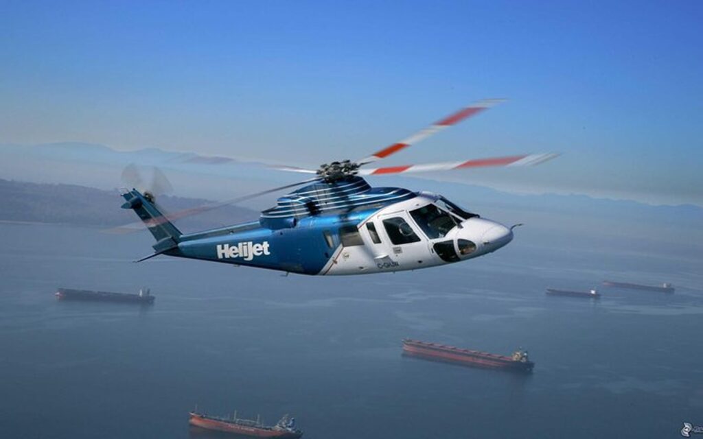 a helicopter flies between vancouver and victoria