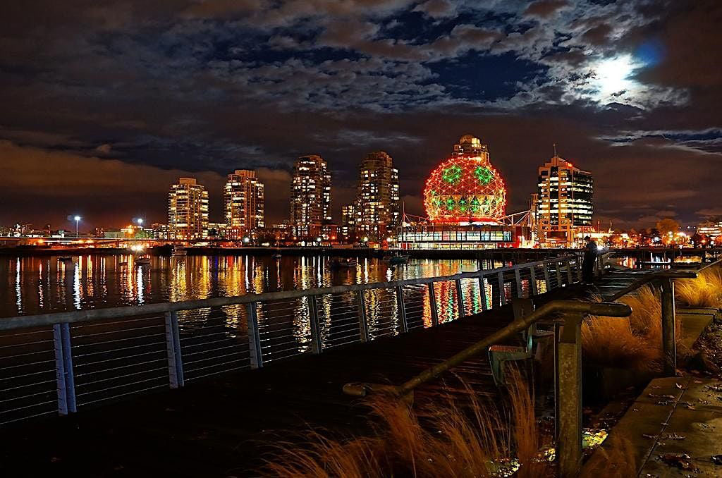 buildings with lights in vancouver bc canada at night