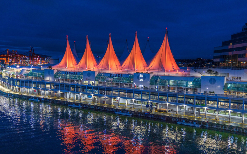 canada place's sails of light in orange to celebrate world day of indigenous peoples