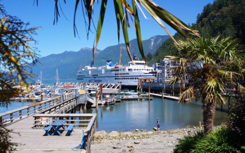 a ferry docks in horseshoe bay vancouver.