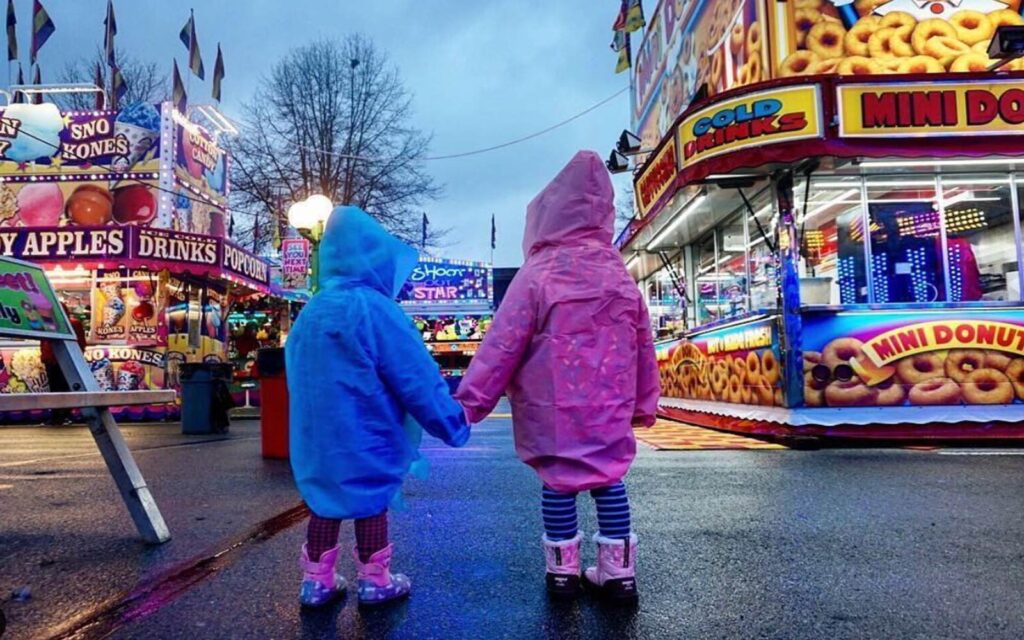two children enjoy the wca carnival at landsdowne carnival in richmond, bc.