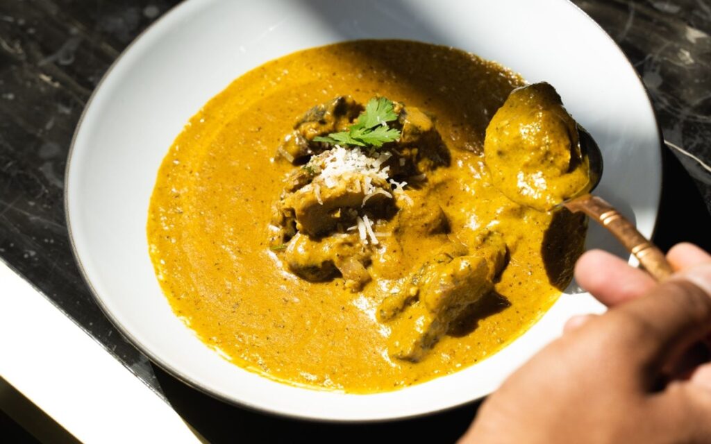 a luscious coconut curry at tasty indian restaurant in downtown vancouver