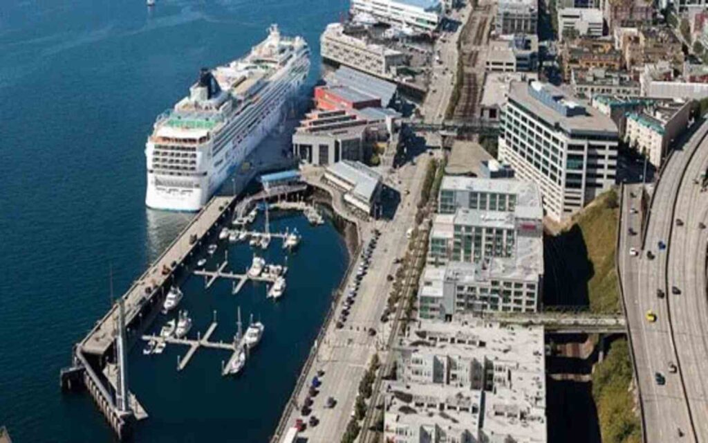 Aerial view of pier 66 where you can ride a cruise shuttle from seattle to vancouver that shows the roads, other boats, and buildings