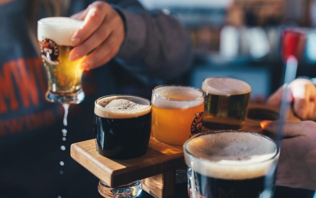 A flight at Steamworks Brewpub, an entry on our list of the best Gastown bars.