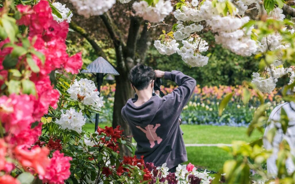 photographer taking pictures of the landscape at butchart gardens