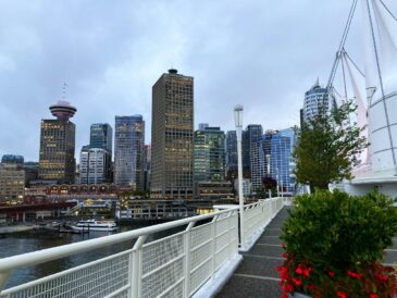 view of canada place sails with vancouver skyline in background