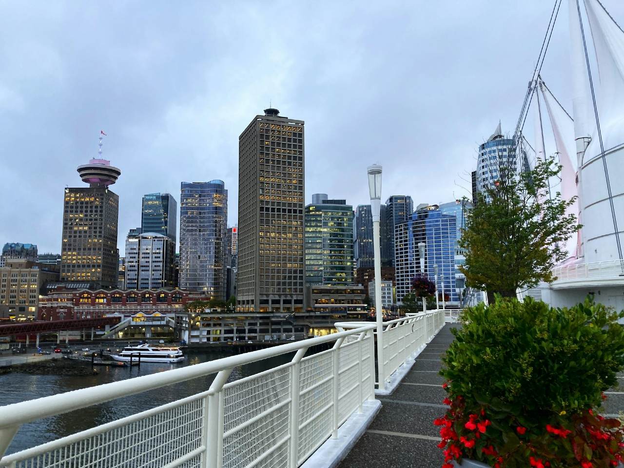 view of canada place sails with vancouver skyline in background