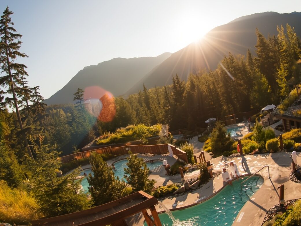 A sunset over the famed Scandinave Spa, one of the best things to do in Whistler in summer.